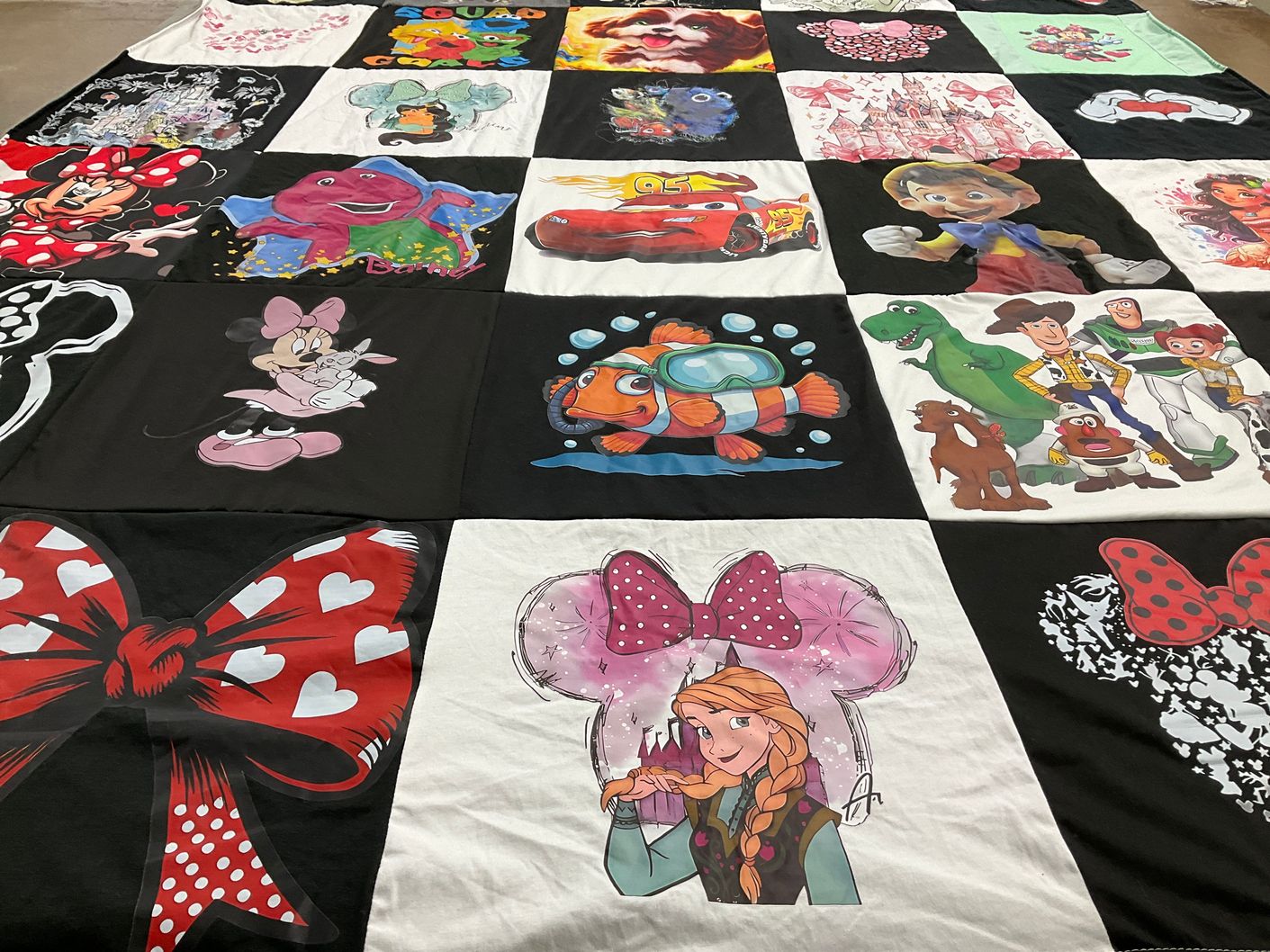 T-shirt quilt with cartoons, disney characters themes by Kristina from WI