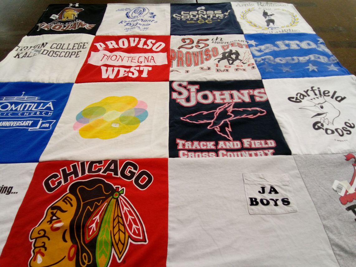 T-shirt quilt featuring proviso west high school track and field, st. john's track and field by Gregory from CA