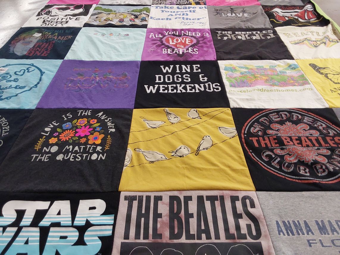 T-shirt quilt with music, pets themes by Julia from OH