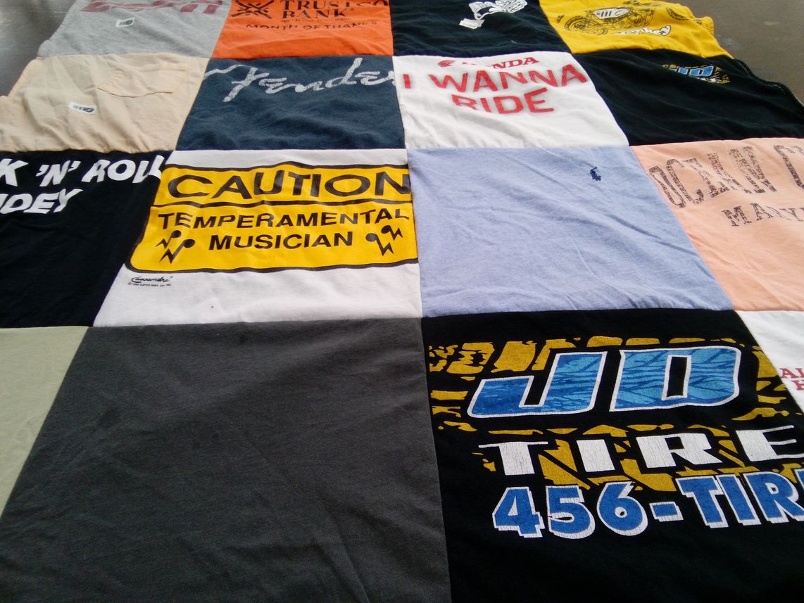 T-shirt quilt with music, motorcycles themes by Erin from NY