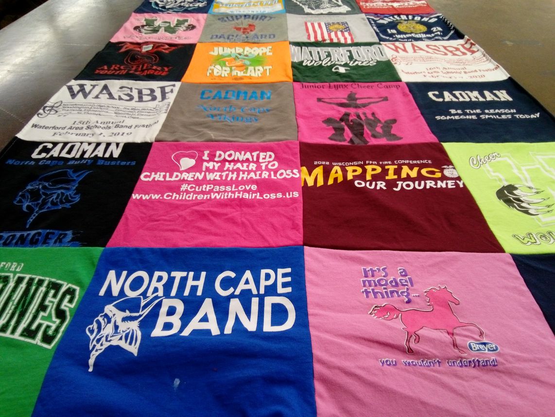 T-shirt quilt featuring waterford wolves by Amanda from WI