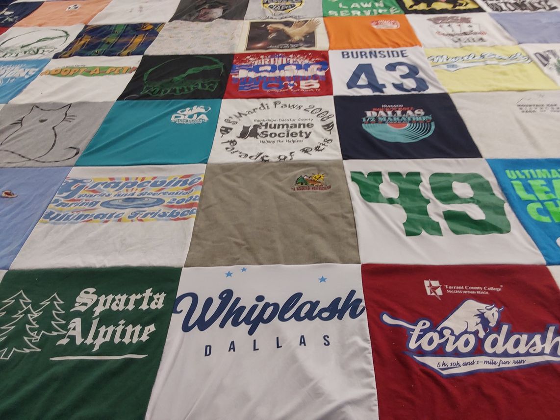 T-shirt quilt with animal welfare, sports themes by Becky from TX