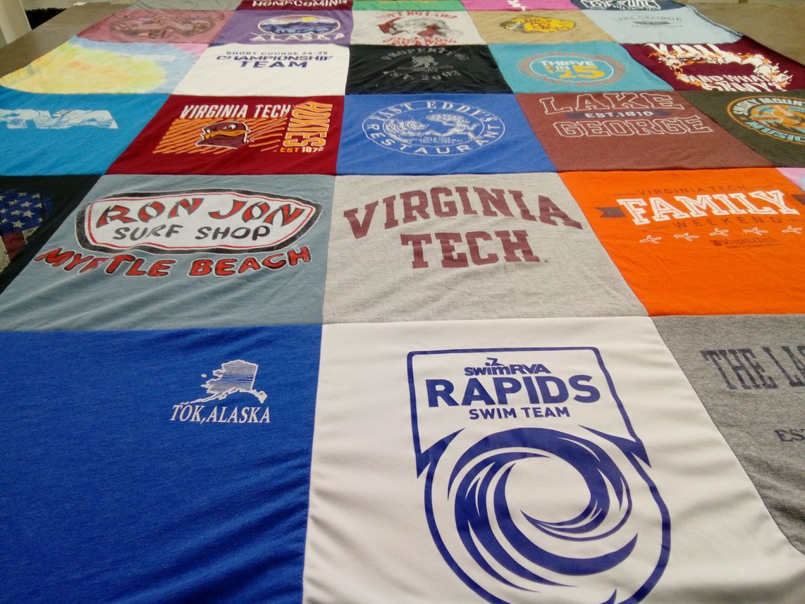 T-shirt quilt featuring swim team by Donald from VA