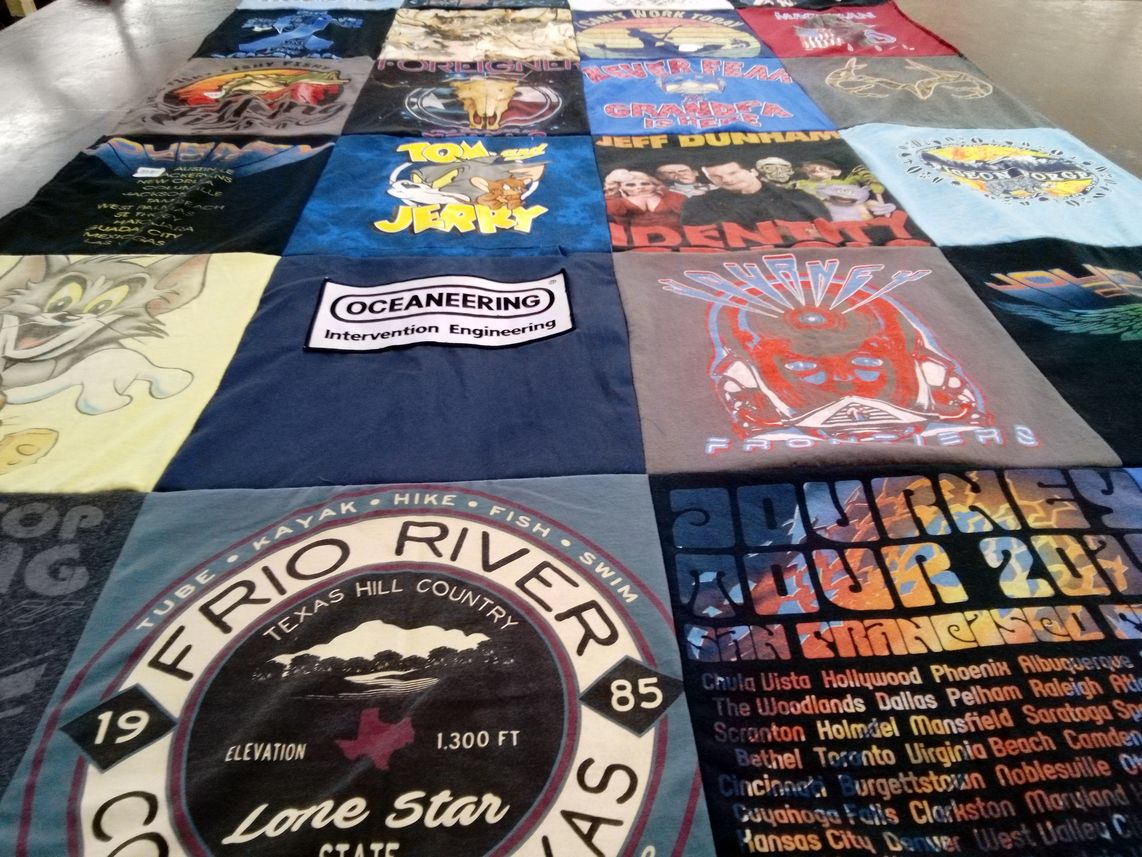 T-shirt quilt with engineering, kayaking themes by Deanna from TX