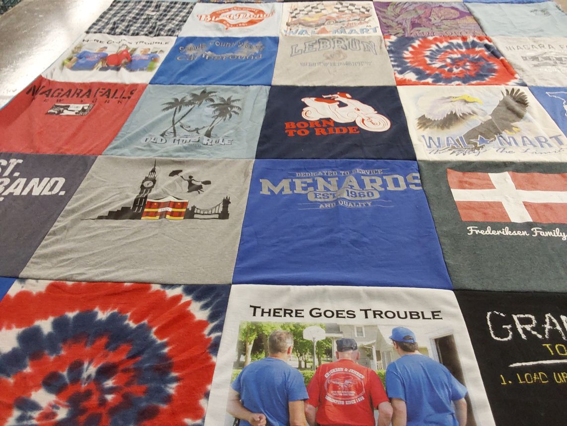 T-shirt quilt with travel, motorcycles themes by Melanie from MN