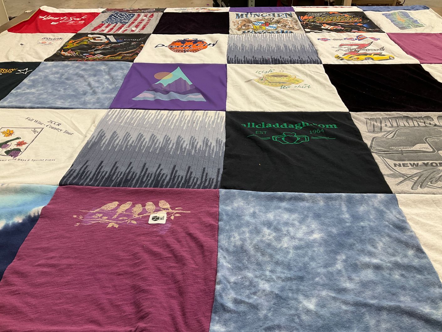 T-shirt quilt with travel, outdoors themes by Ginger from NY