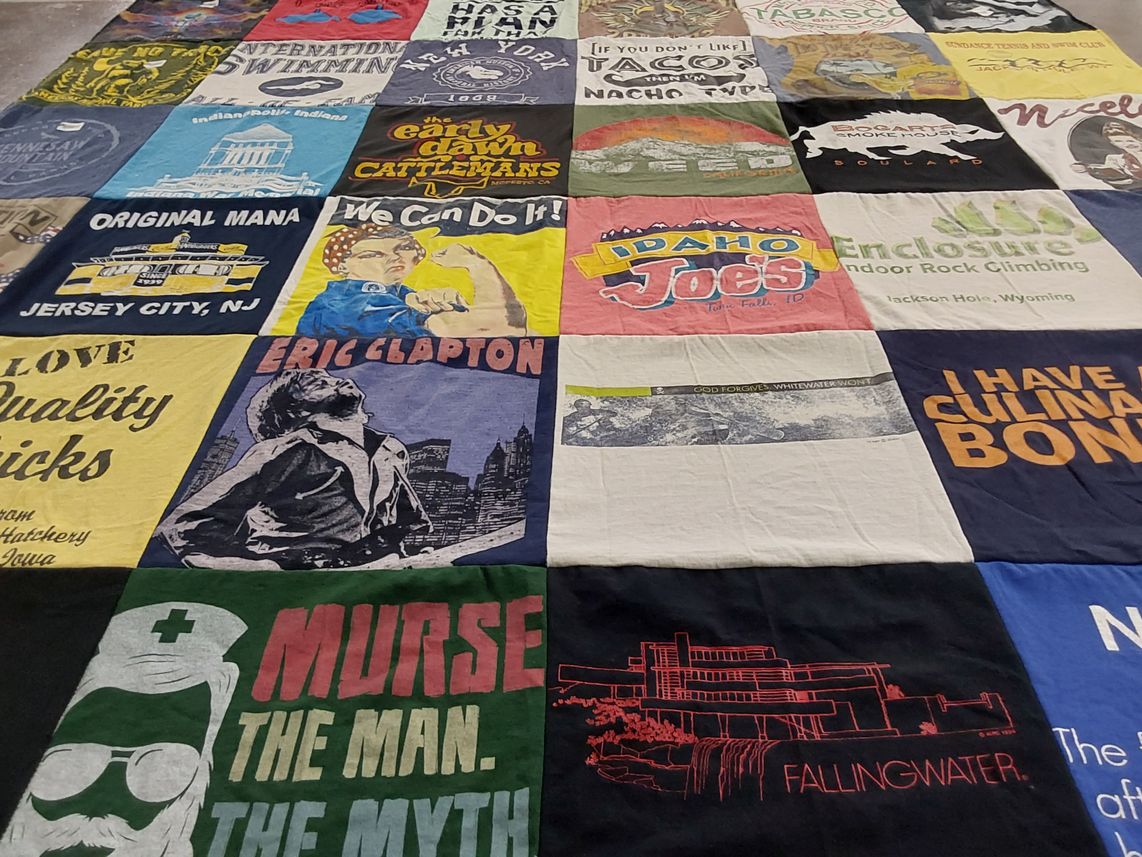 T-shirt quilt with music, cooking themes by Kay from OK