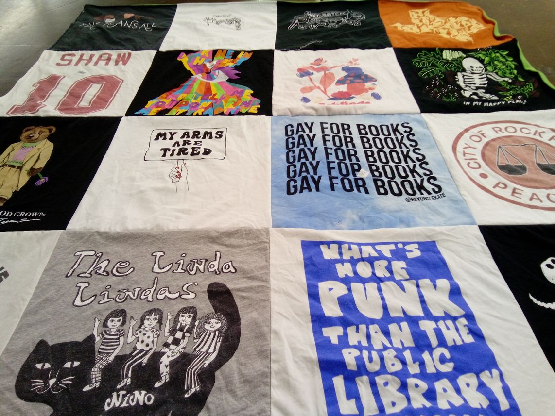 T-shirt quilt with books, punk culture themes by Sara from DC