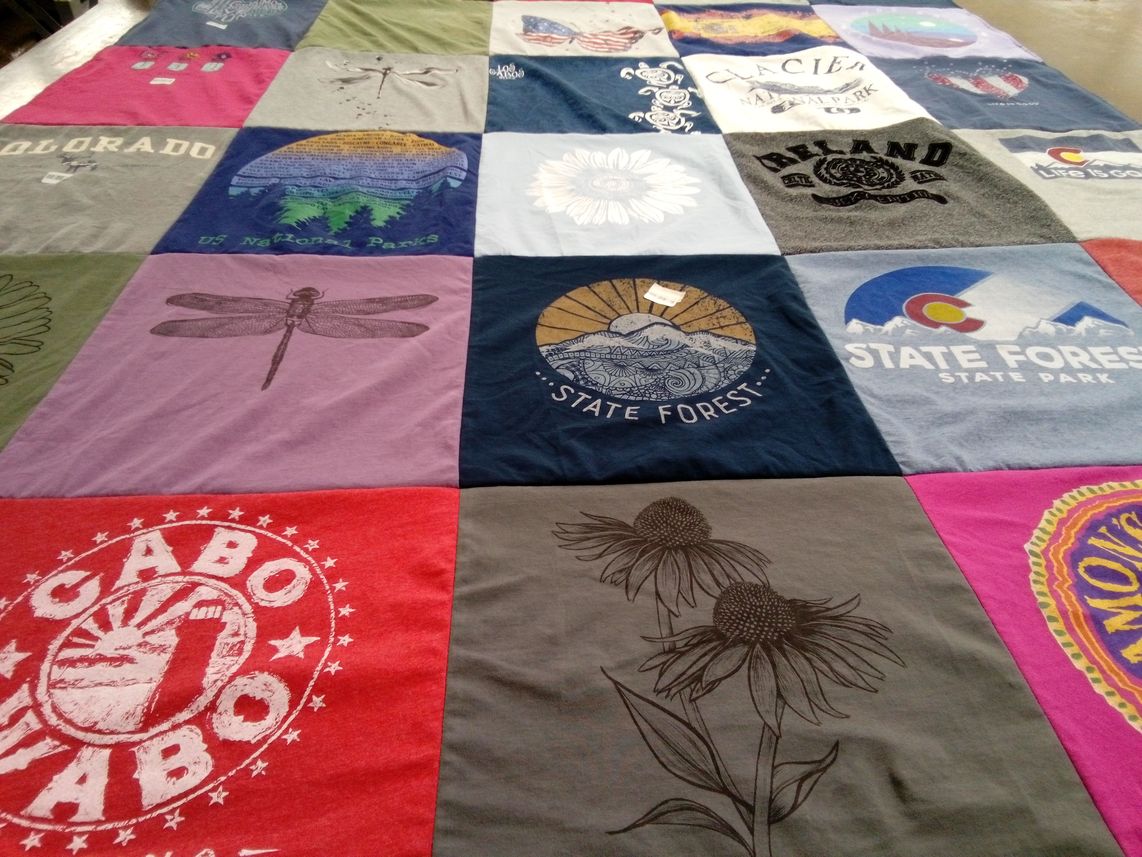 T-shirt quilt with nature, travel themes by Leslie from CO