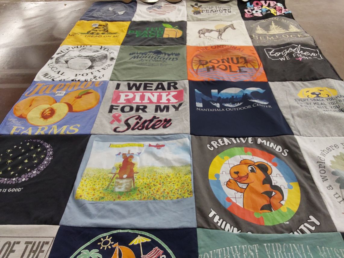 T-shirt quilt with supporting local businesses, outdoor activities themes by Kathryn from VA