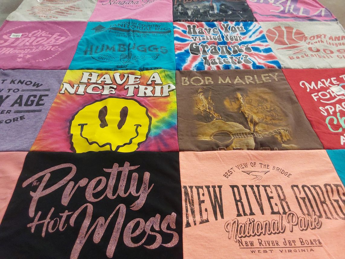 T-shirt quilt with travel, music themes by Lexi from WV