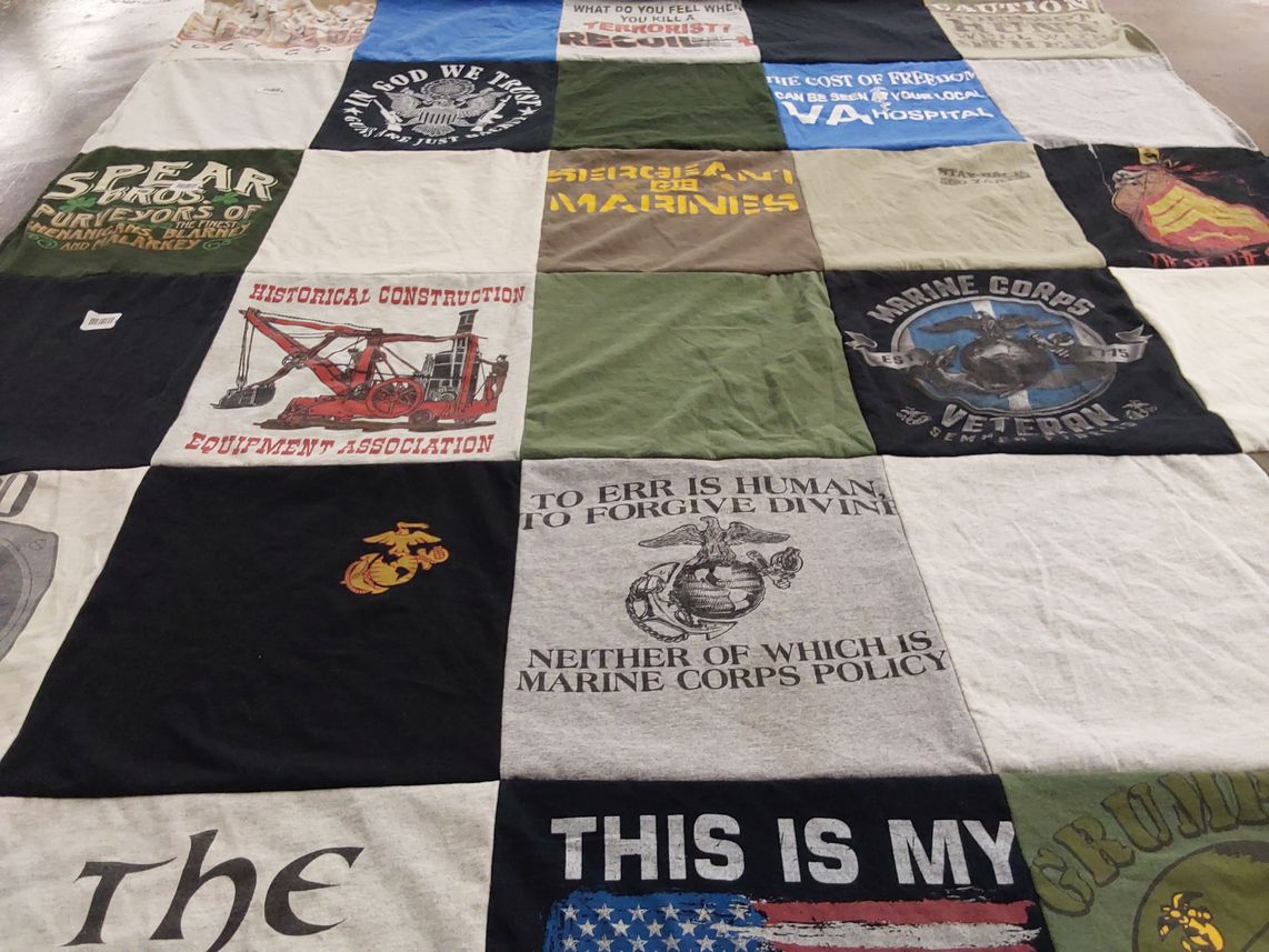 T-shirt quilt with military, construction themes by Pam from CA