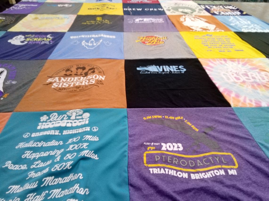 T-shirt quilt with running, triathlons themes by Sara Lynne from MI