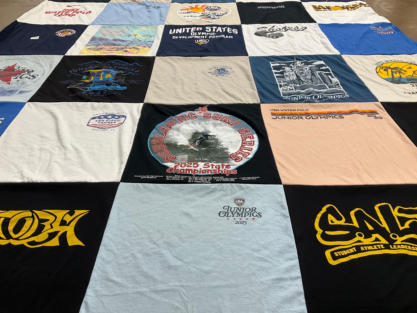 T-shirt quilt with water polo, surfing themes by Lisa from CA