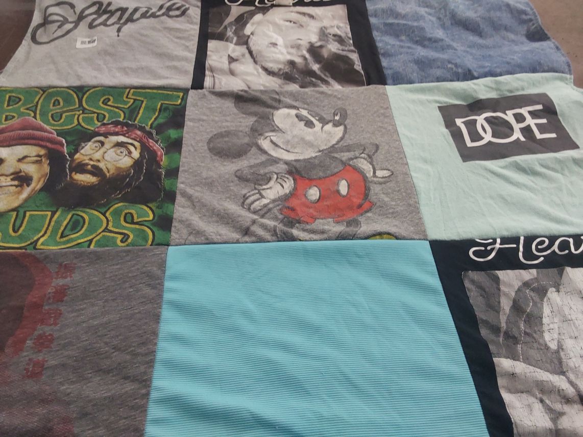 T-shirt quilt with music, pop culture themes by Ariel from TX