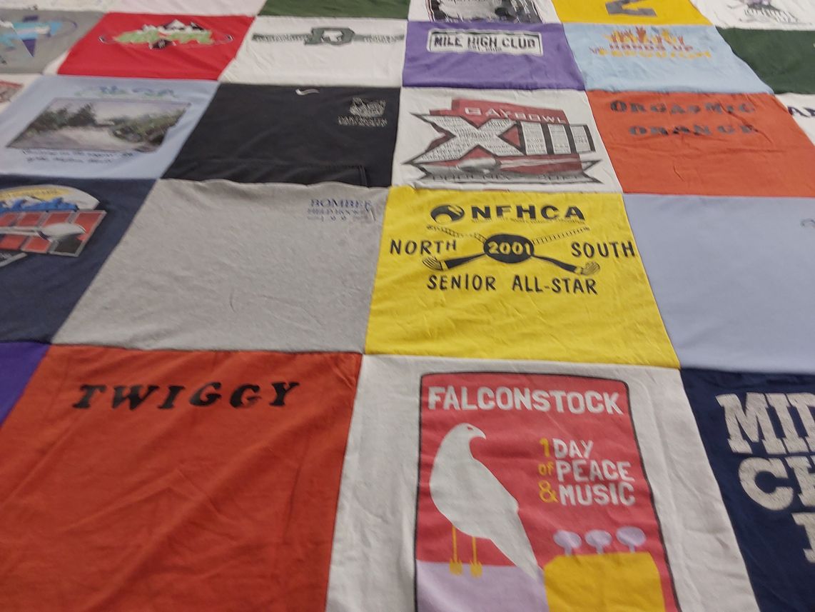 T-shirt quilt with music, community events themes by Tara from CO