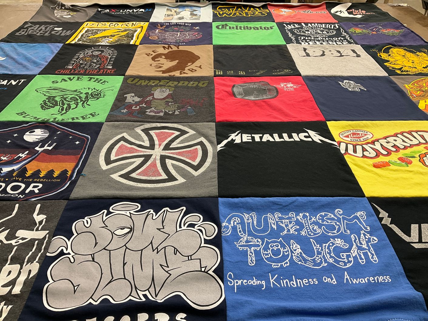 T-shirt quilt with music, autism awareness themes by Rebecca from PA