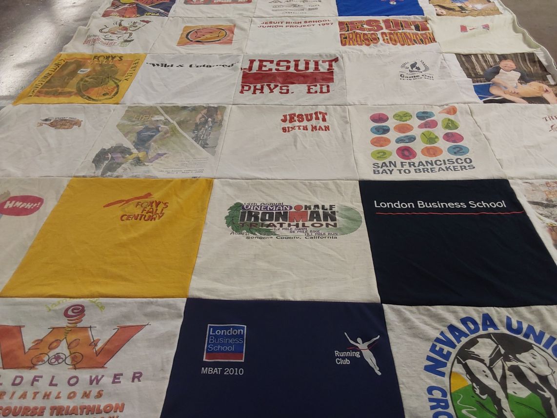 T-shirt quilt from jesuit high school, london business school by Carole from CA