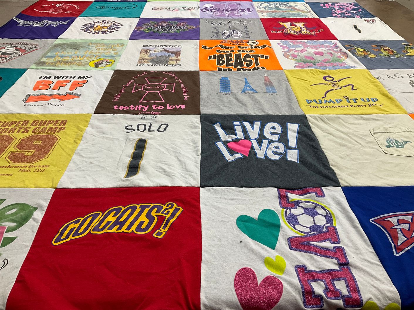 T-shirt quilt with sports, friends themes by Sheri from TX