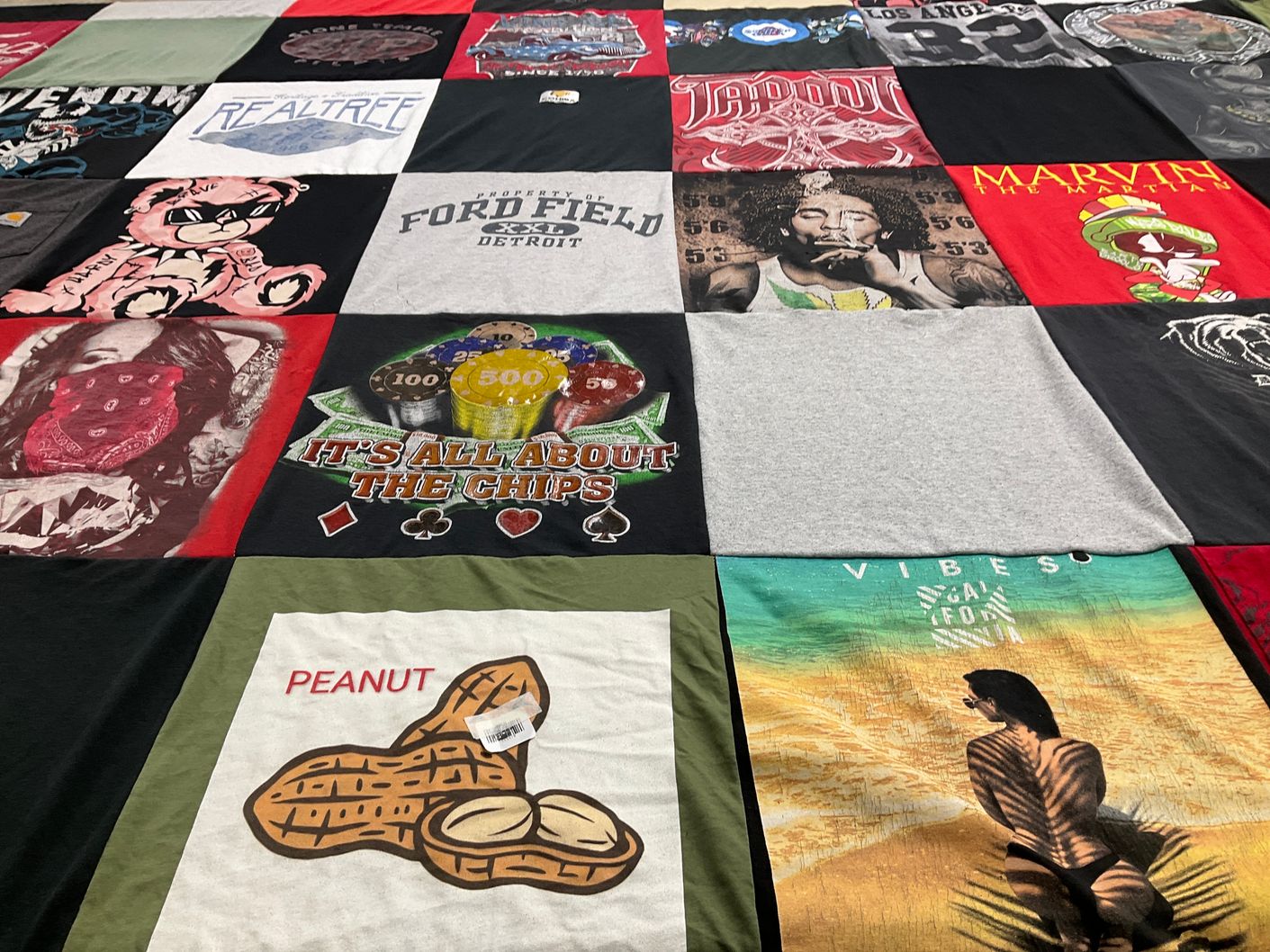 T-shirt quilt with gaming, outdoors themes by Rosie from AZ