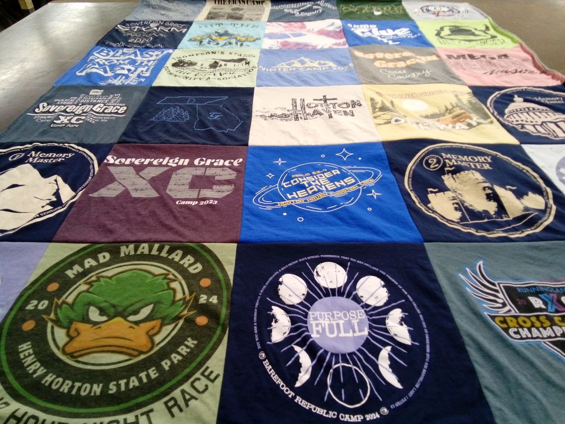 T-shirt quilt with camping, running themes by Nicole from TN
