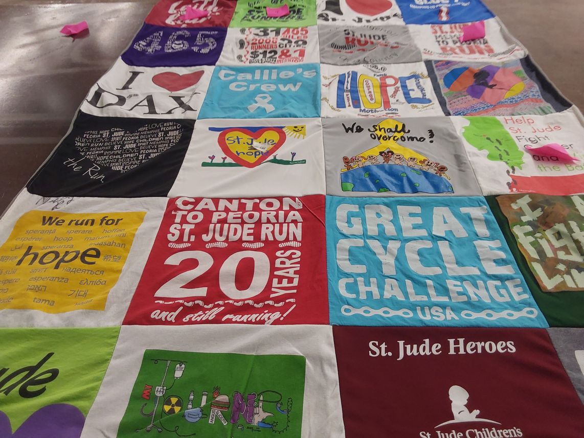 T-shirt quilt with charity, fundraising themes by Brenda from IL