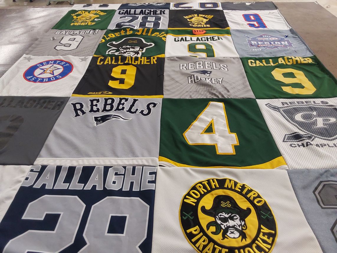 T-shirt quilt featuring rebels hockey by Mary from MN