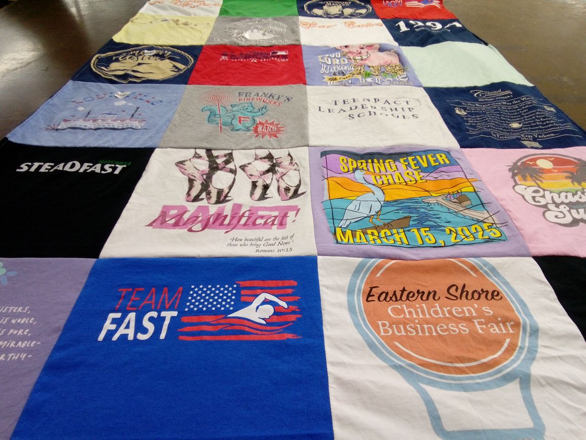 T-shirt quilt with community events, fundraising themes by Billie from AL