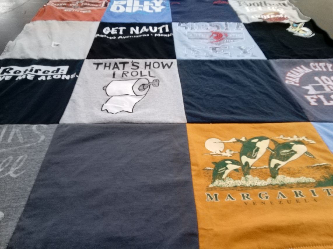 T-shirt quilt with humor, travel themes by Barbara from IN