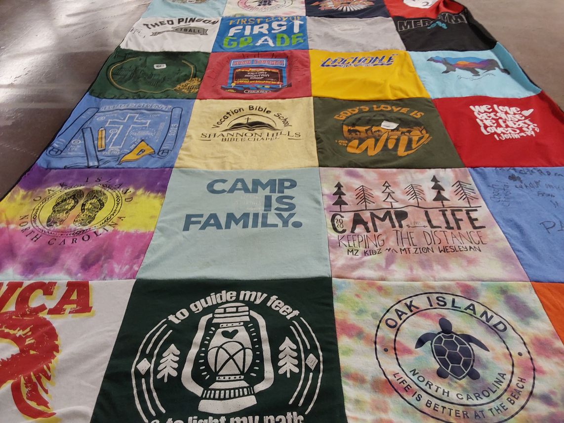T-shirt quilt with camping, bible study themes by Emily from NC