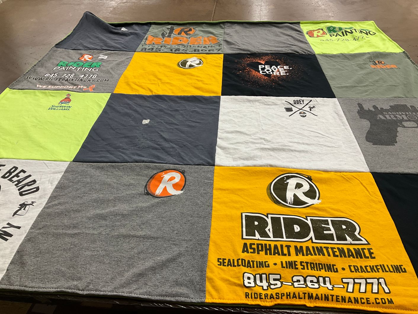 T-shirt quilt with painting, asphalt maintenance themes by Catherine from NY