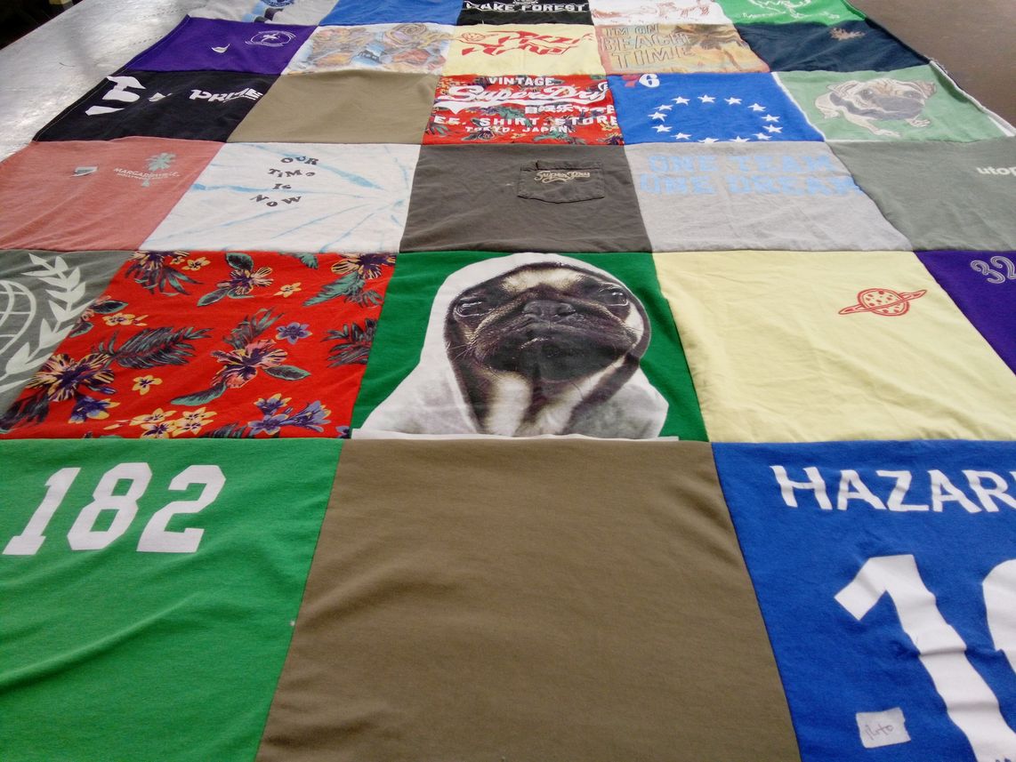 T-shirt quilt with floral patterns, pets themes by Liz from NC