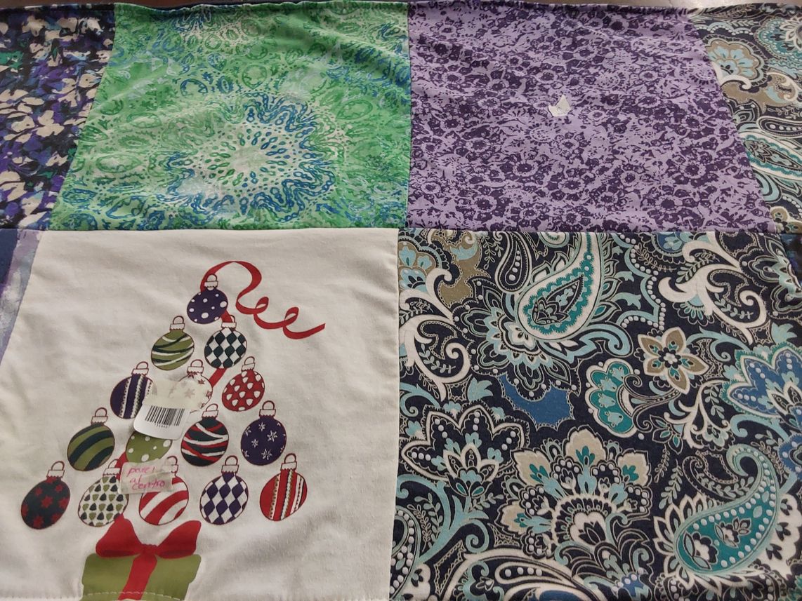 T-shirt quilt with quilting, christmas themes by Paula from CA