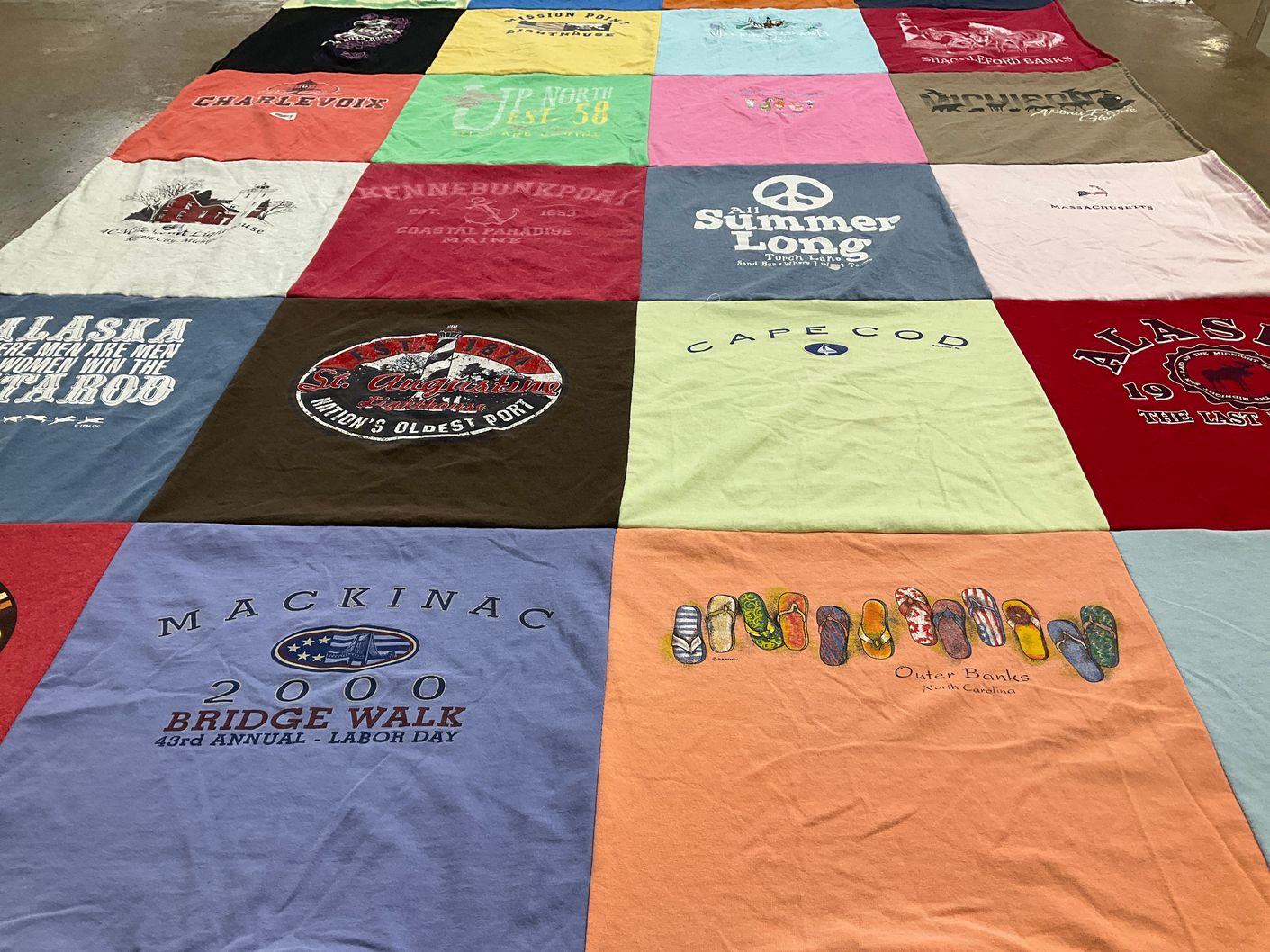 T-shirt quilt with travel, beaches themes by Carly from MI