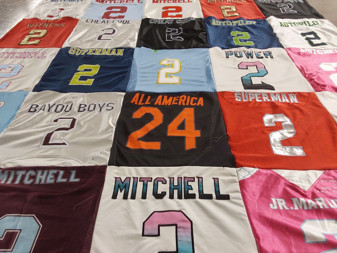 T-shirt quilt with sports themes by Karen from TX