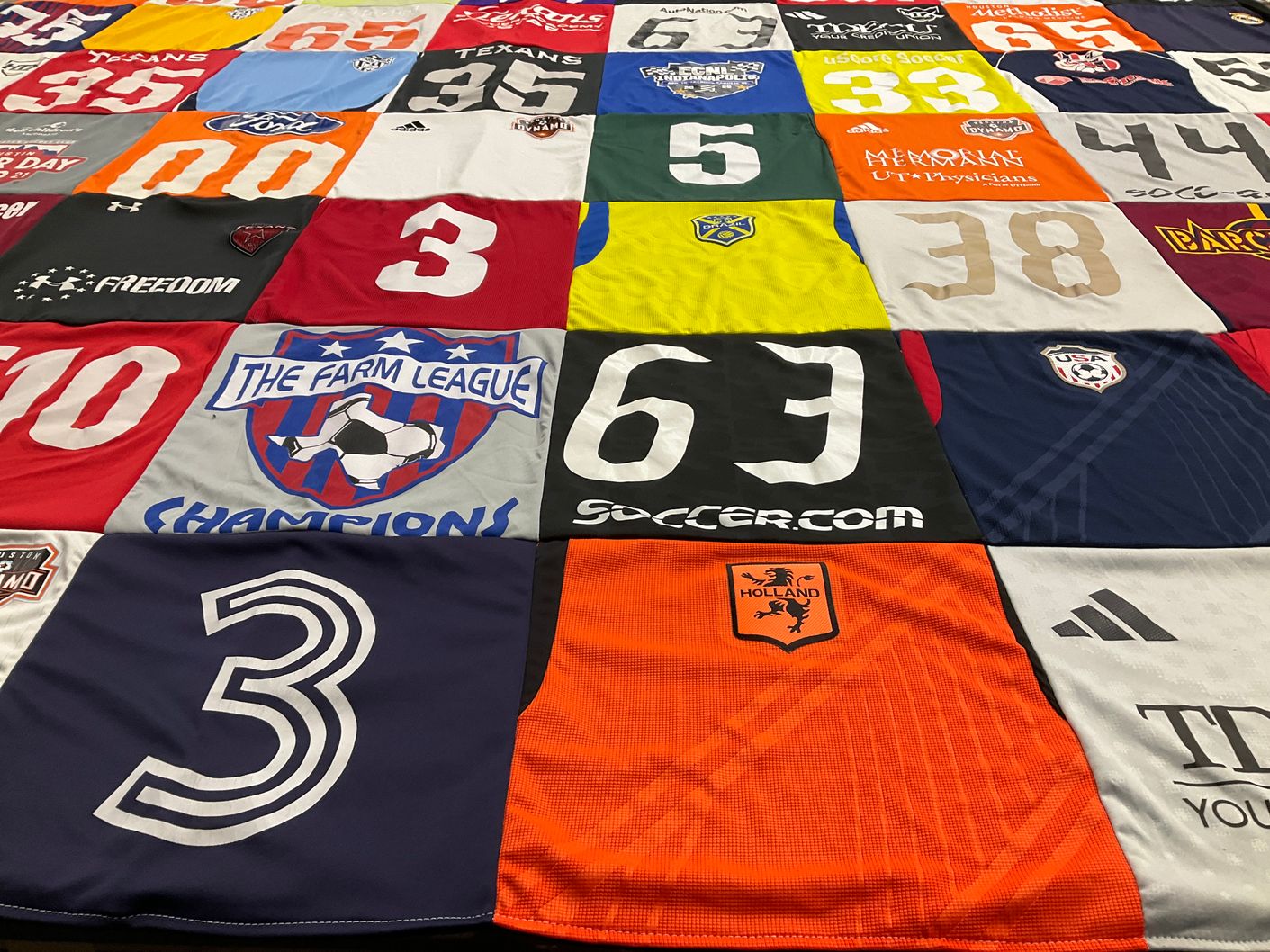 T-shirt quilt with soccer themes by Kellee from TX