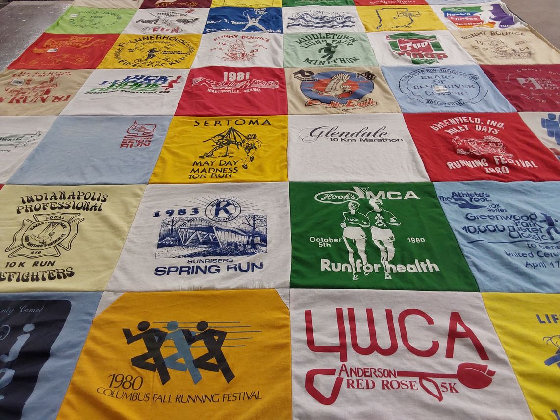 T-shirt quilt with running, fitness themes by Jane from IN