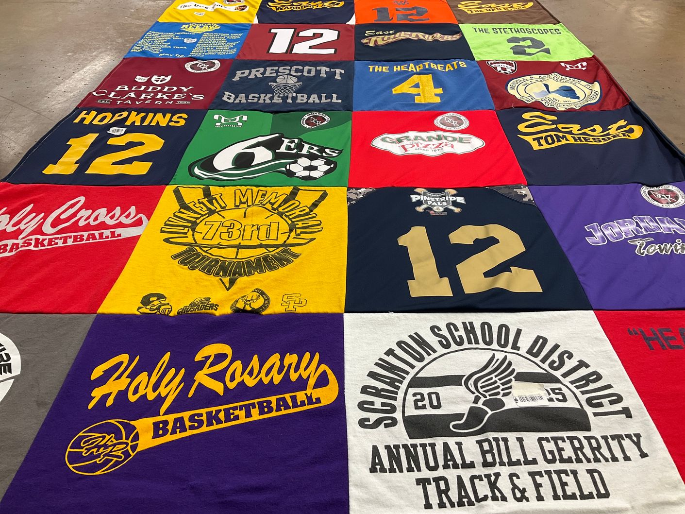T-shirt quilt featuring holy cross basketball, holy rosary basketball by Charlene from PA