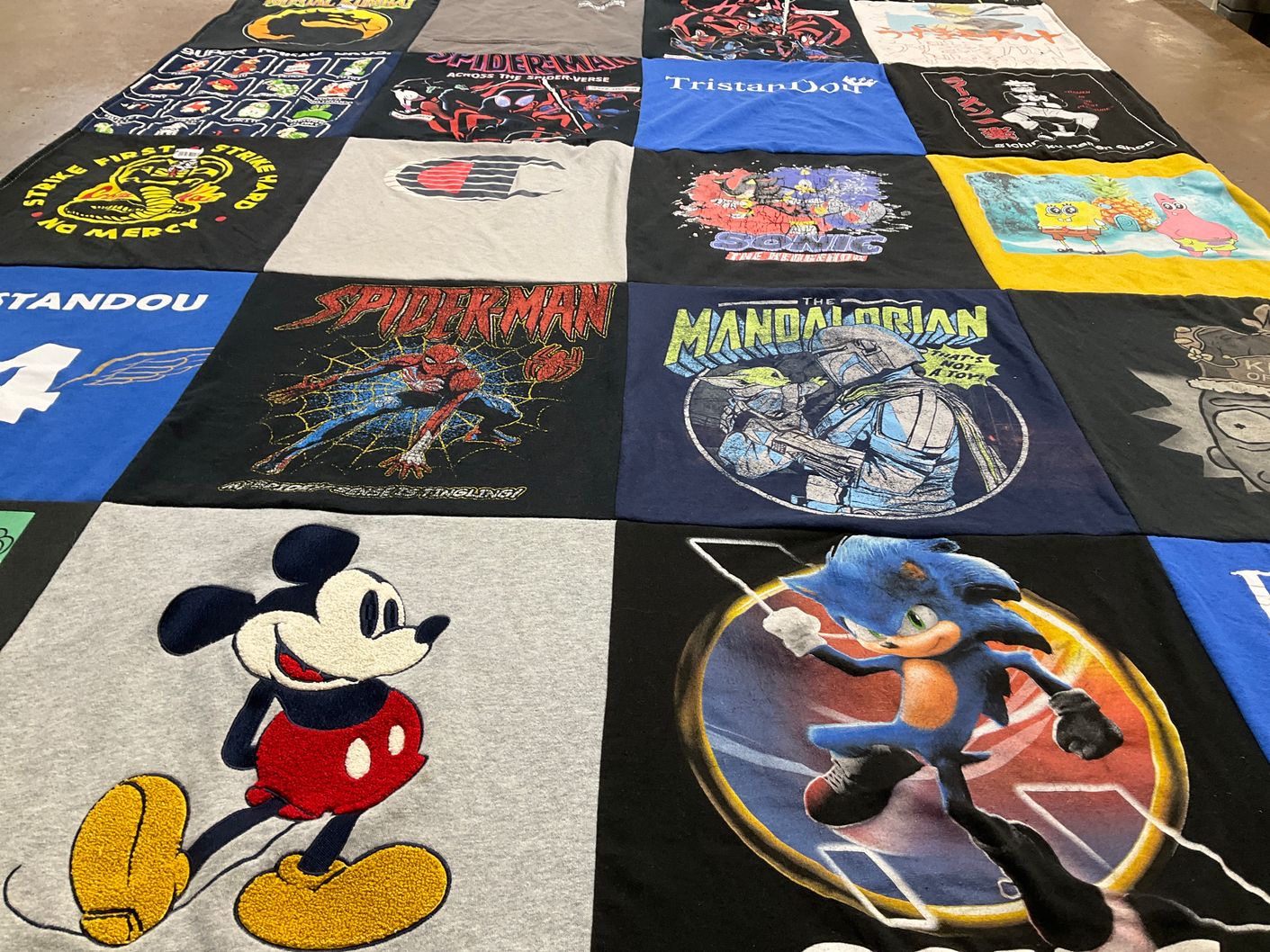 T-shirt quilt with cartoons, comics themes by Abbigail from MI