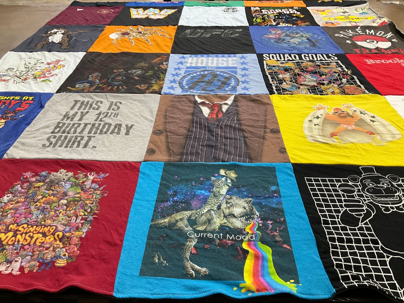 T-shirt quilt with gaming, cartoons themes by Carrie from NJ