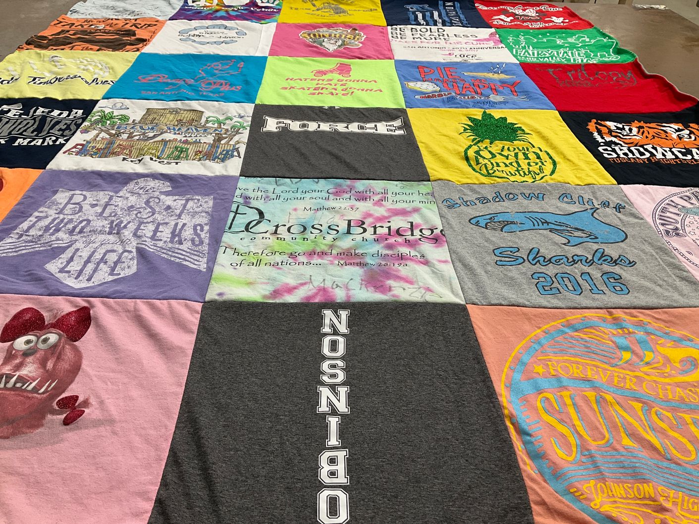T-shirt quilt featuring shadow cliff sharks by Linda from TX