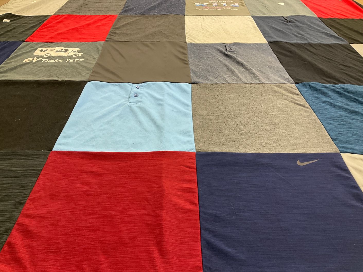 T-shirt quilt with traveling, outdoor activities themes by Renee from CO