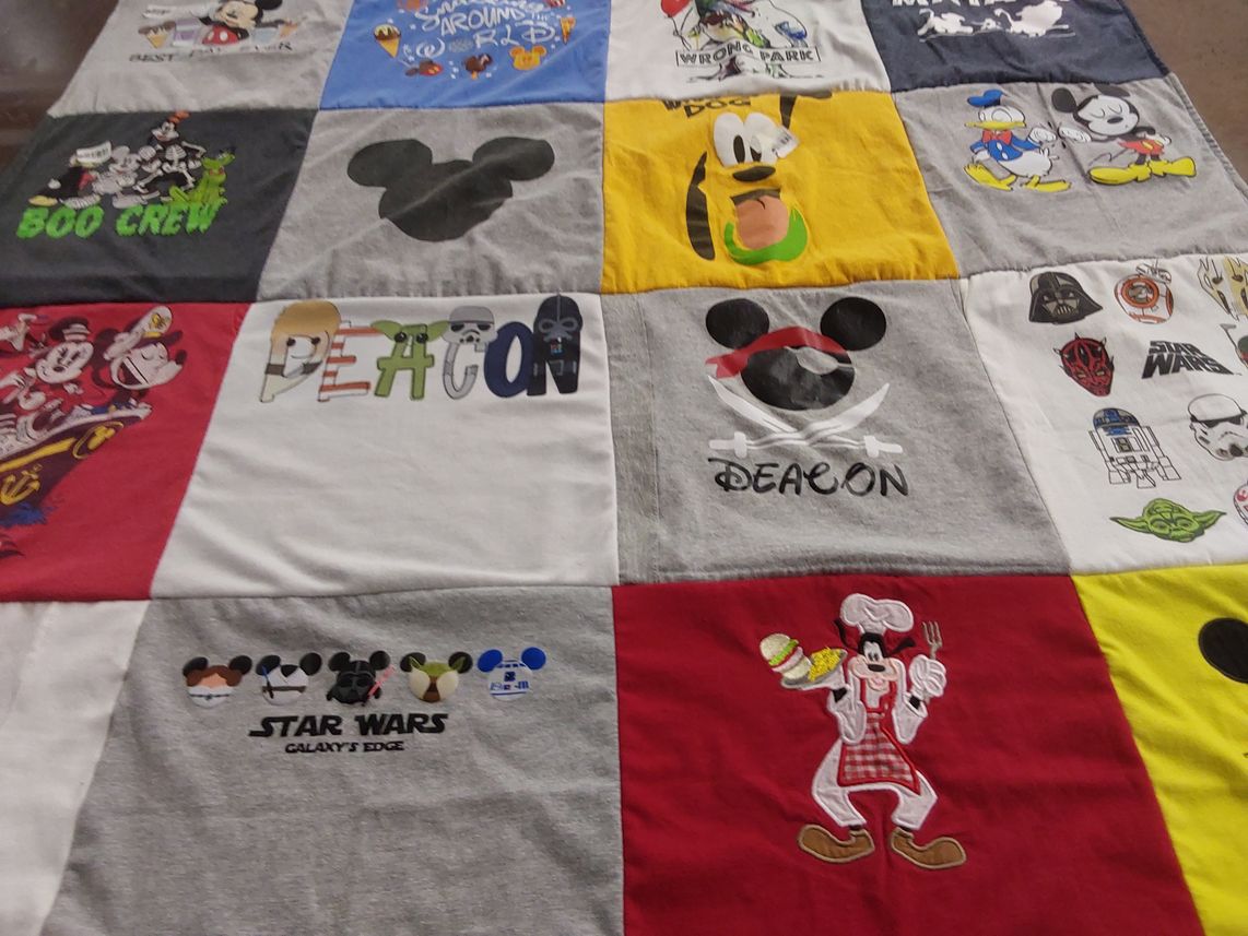 T-shirt quilt with disney, star wars themes by Sheena from KY