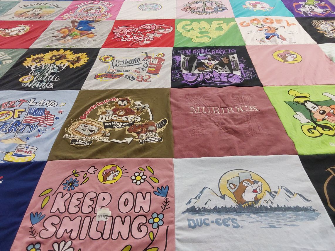 T-shirt quilt with cartoons, road trips themes by Andrea from IL