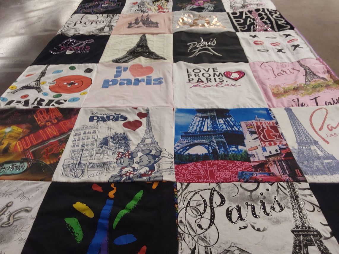 T-shirt quilt with travel, fashion themes by Debora from CA