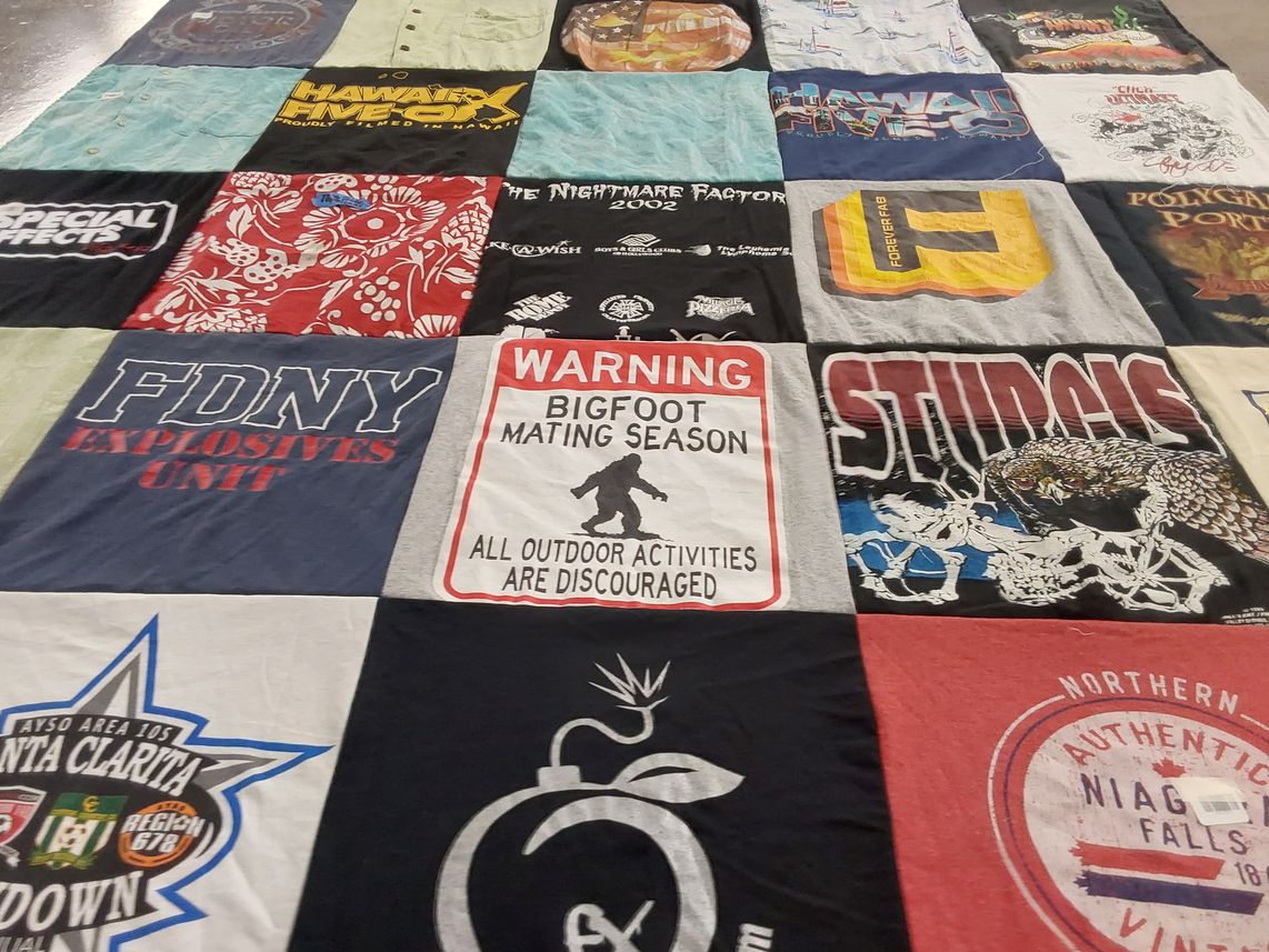 T-shirt quilt with firefighting, hiking themes by Beverley from GA