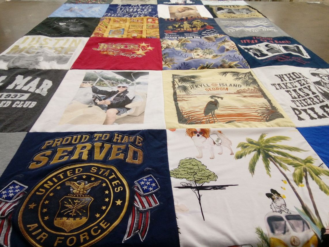 T-shirt quilt with travel, military themes by Mary from GA