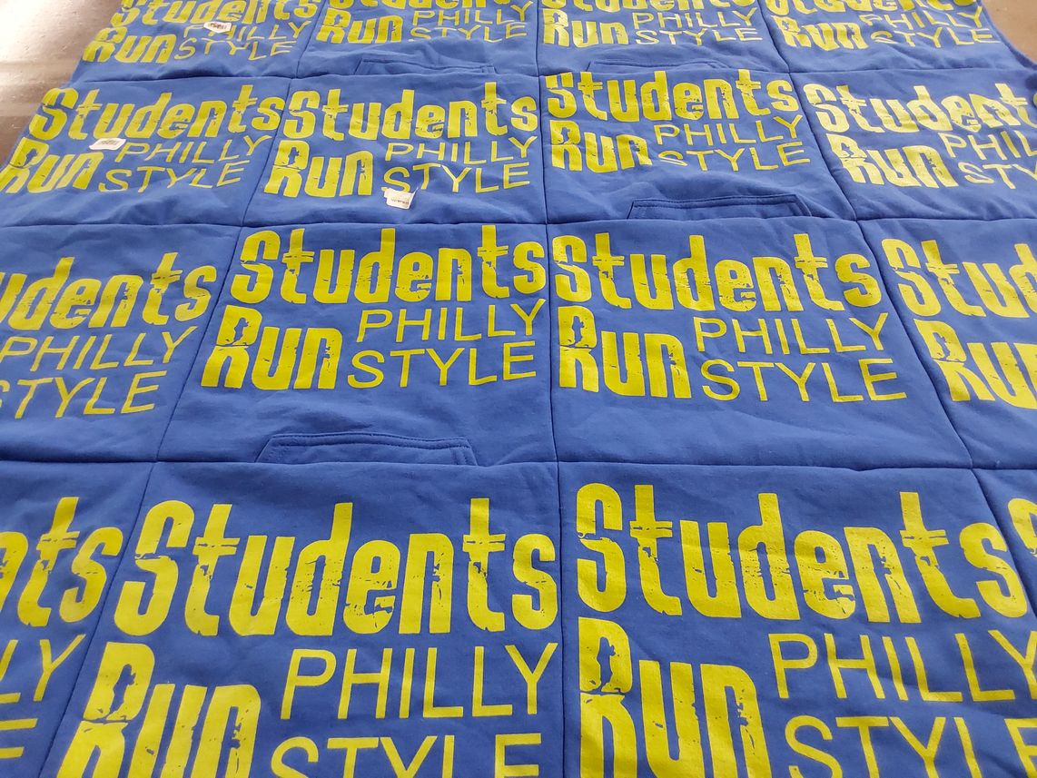 T-shirt quilt with running, education themes by Lauren from PA