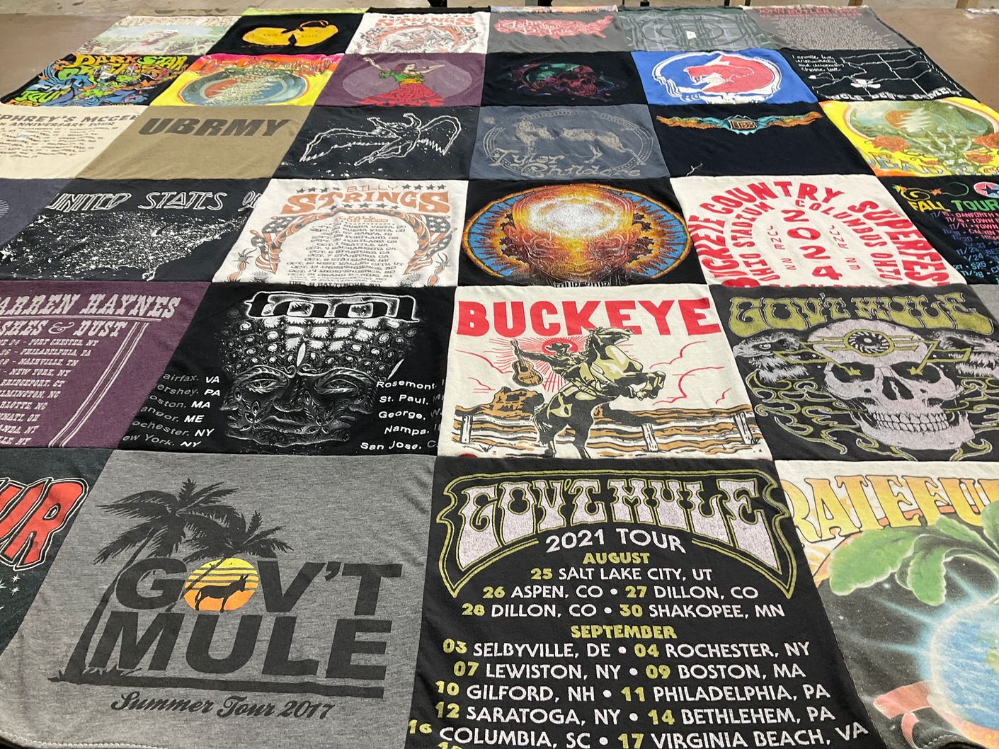 T-shirt quilt with music, concerts themes by Regina from NY