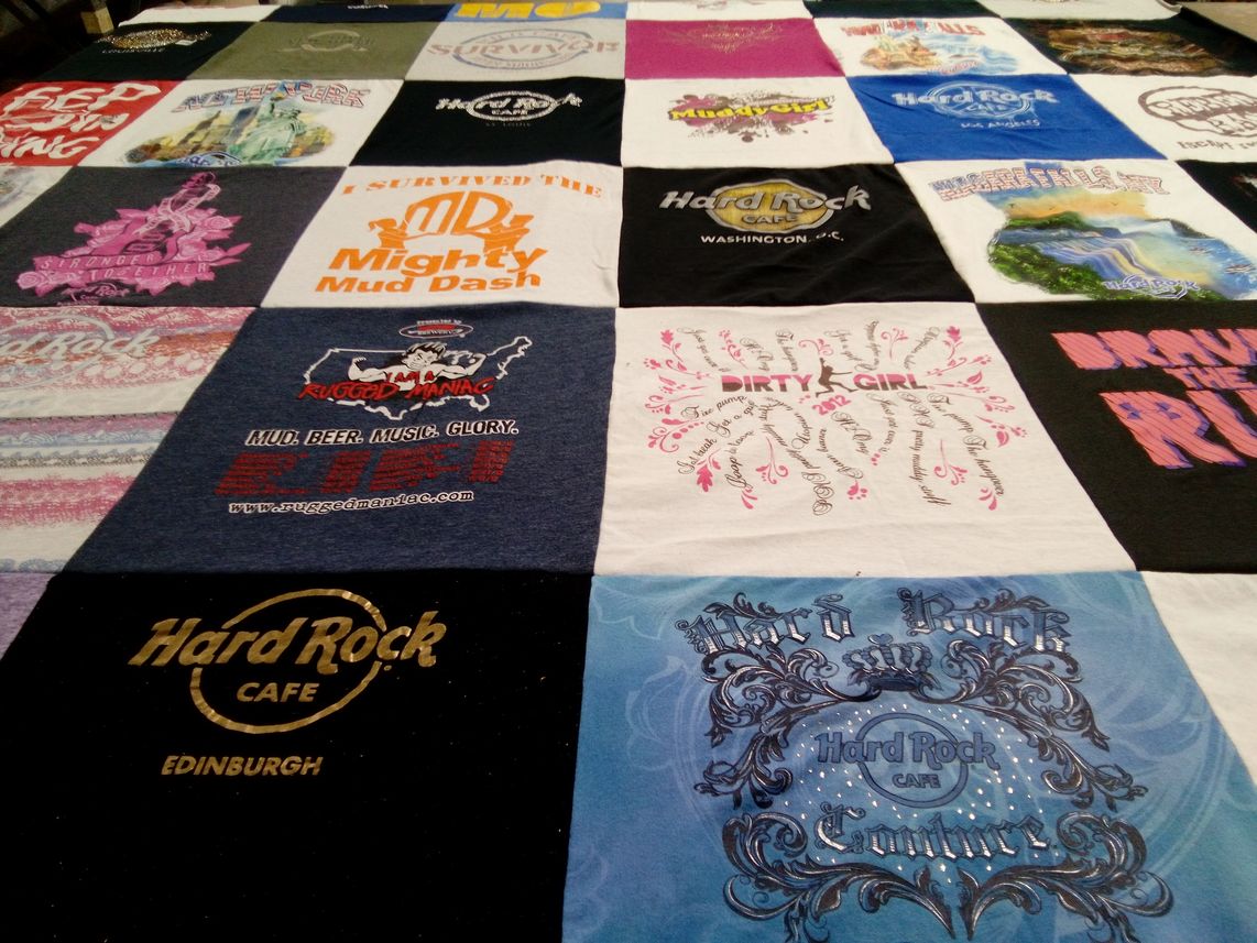 T-shirt quilt with mud runs, music festivals themes by Sandra from TX